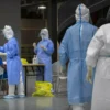 APTOPIX Virus Outbreak China Tests Photo Essay