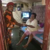 Pemuda Pancasila Bantu Korban Banjir Rob
